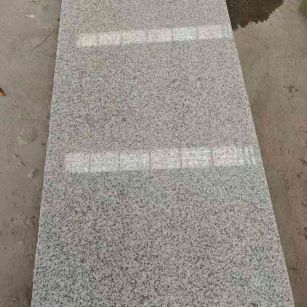 娄底芝麻白光面毛板